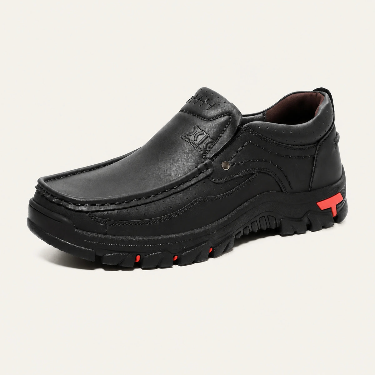 Black XK8815 slip-on shoe with a padded collar and red outsole accents.