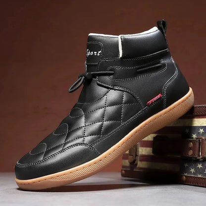 Black 95856 quilted ankle boot displayed beside a vintage storage case.
