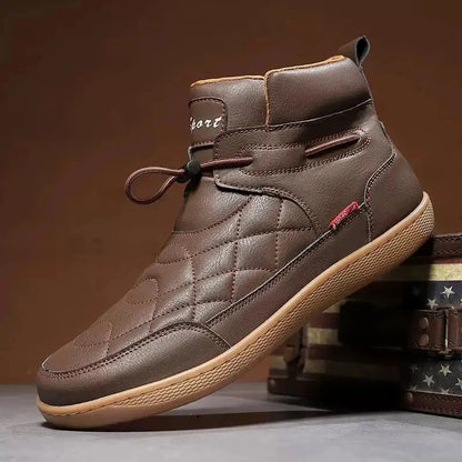 Dark brown 95856 quilted ankle boot displayed beside a vintage storage case.