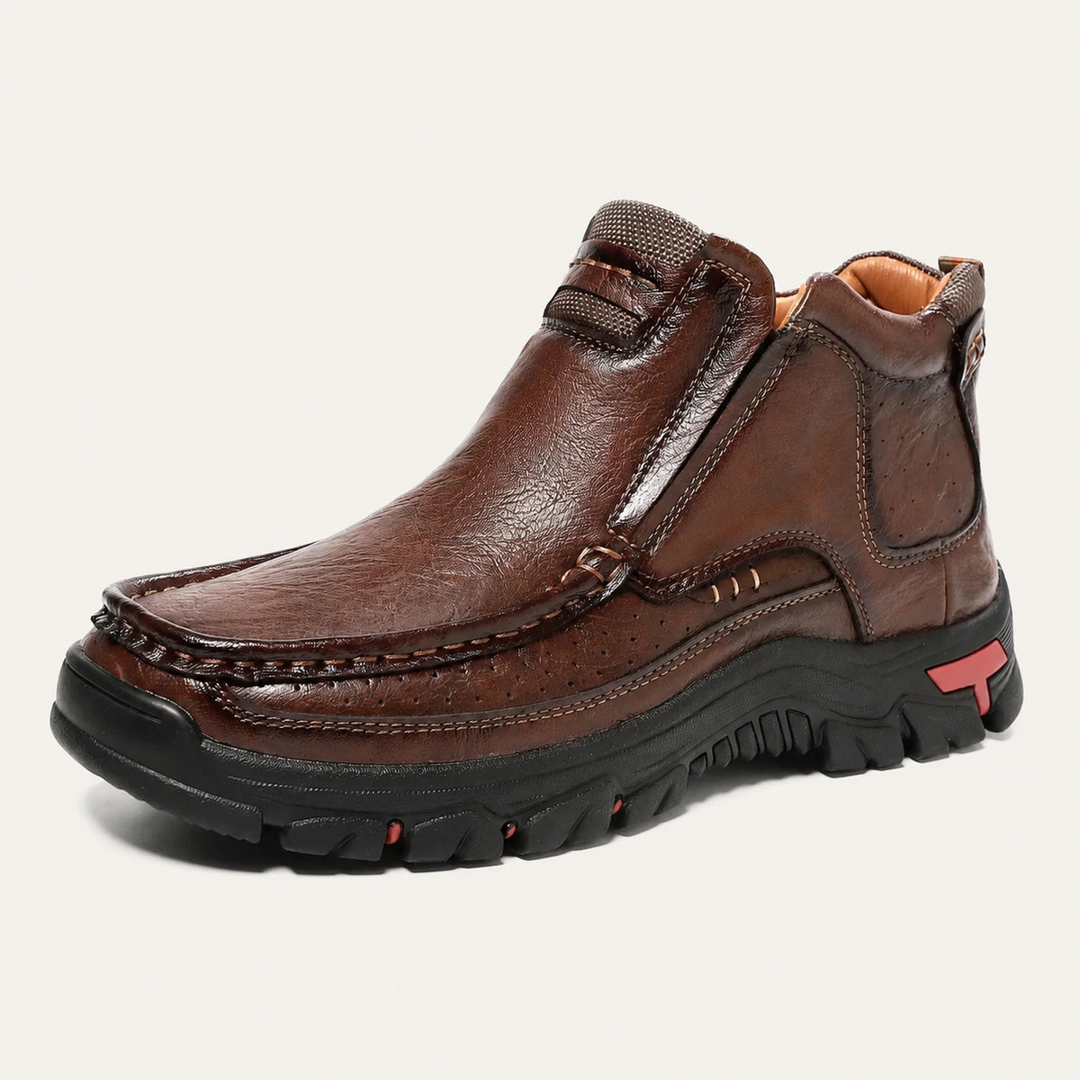 Dark brown 33238 slip-on ankle boot with elastic side panels and a black textured outsole.